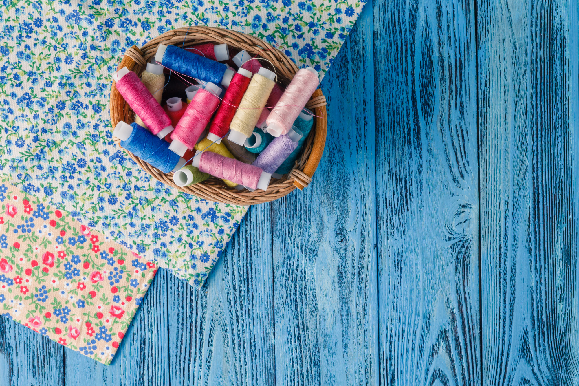 stack of embroidered samples on table